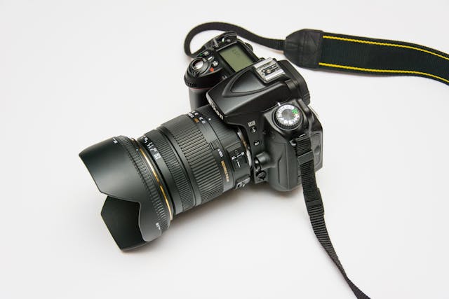a professional photography camera is with a large lens