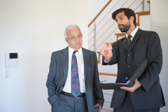 landlord conducting a property showing with a prospective tenant