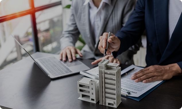 Guy with a laptop editing a document