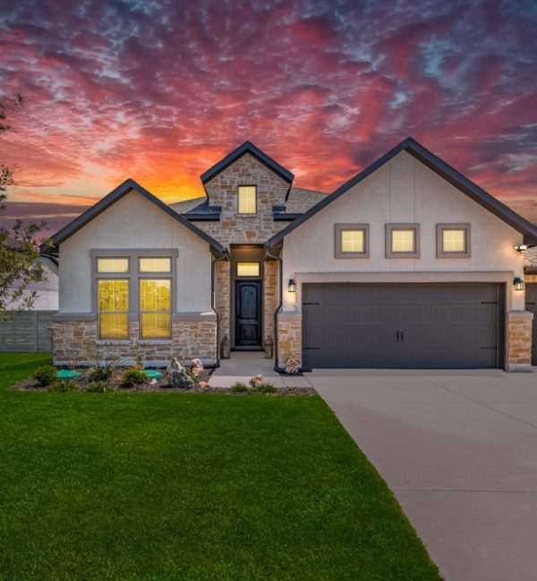 A,Home,At,Sunset,With,A,Driveway house in arizona